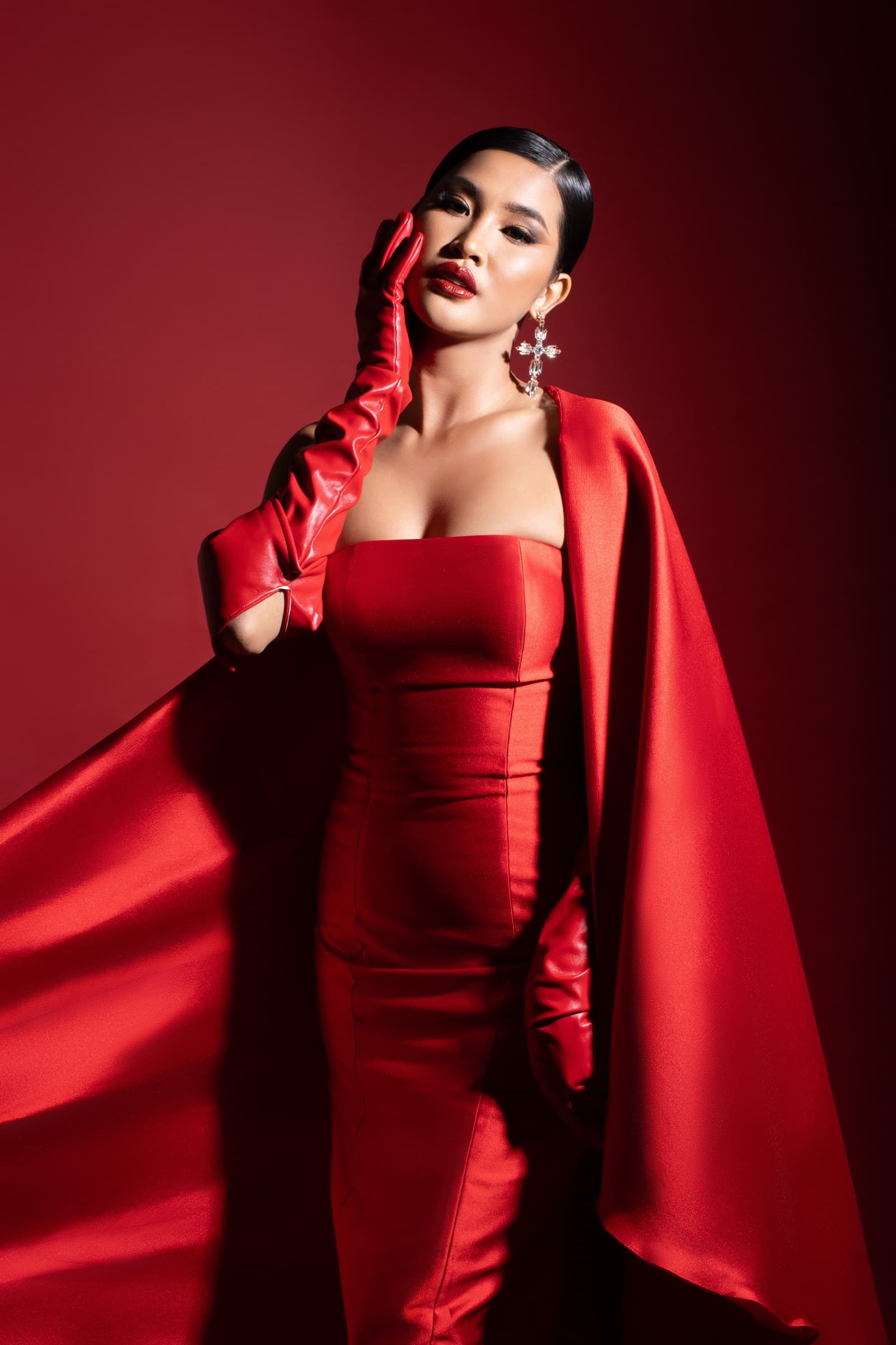 Pageant contestant in a red gown